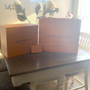 Authentic XL Louis Vuitton shopping bag and XL deep Louis Vuitton gift box.